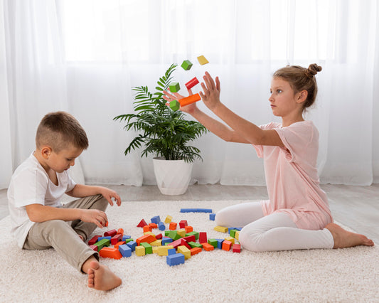 Ramakra | Girl and a kid playing with learning toys for kids